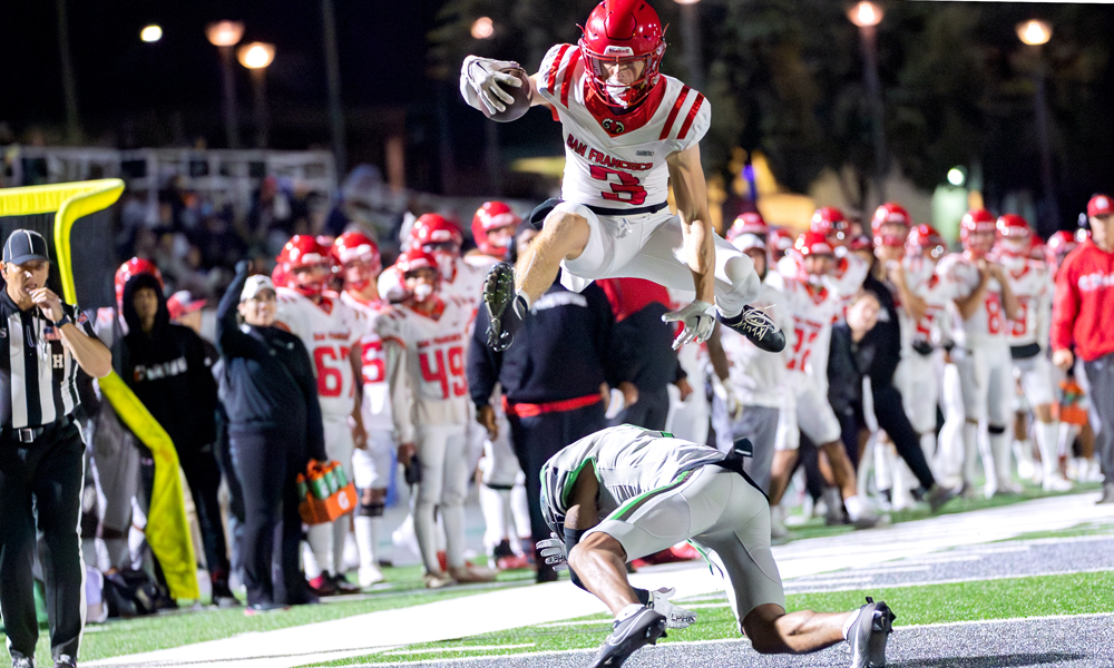 Max Rodarte avoids a tackle in the Rams' win at Laney. (Photo by Eric Sun)