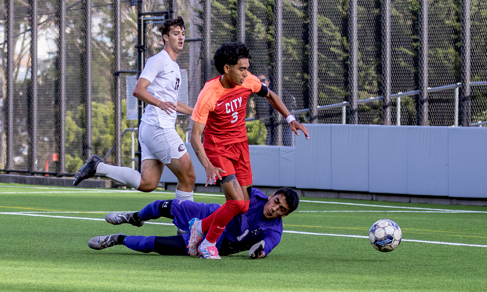 CCSF's Isaac Borrayo is fouled on a breakaway that led to a penalty-kick goal in the second half vs. Monterey Peninsula. (Photo by Eric Sun)