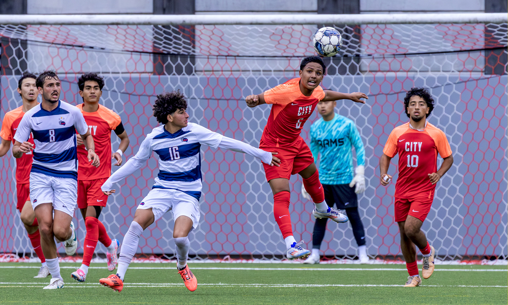 Chris Jackson (#6) heads the ball away in the Rams' 1-0 win over Santa Rosa. (Photo by Eric Sun)